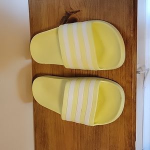 Yellow Adidas slip-on sandals